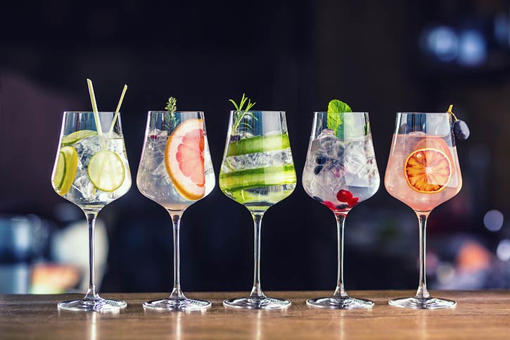 Line Of Cocktails With Fruits.
