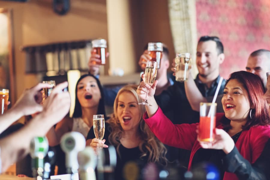 Guests Toasting With Party Drinks For Everyone 