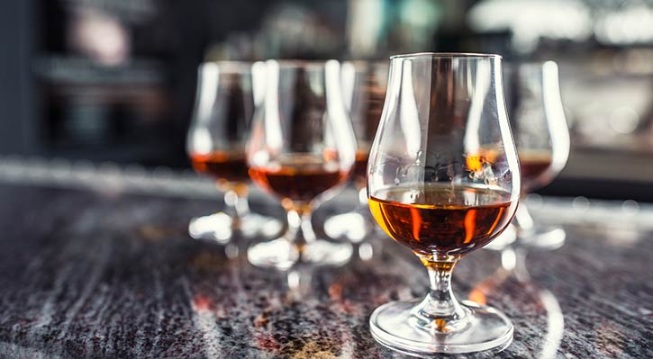 Glasses Of Brandy On Counter.