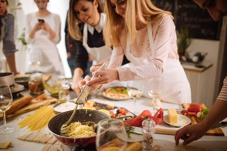 Friends Cooking Together.