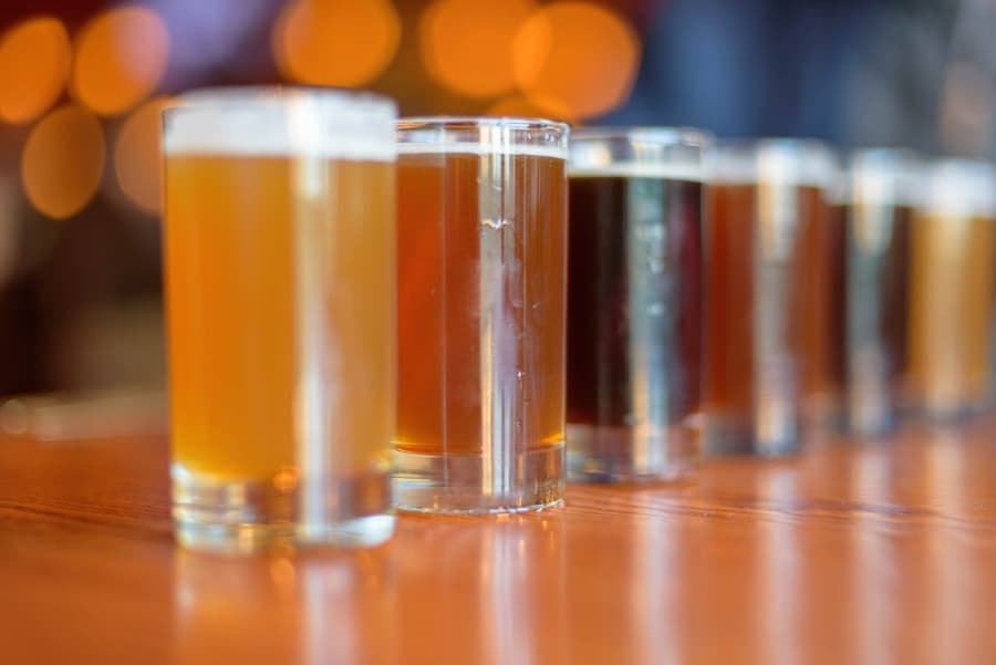 Low angle closeup of beer flight on table