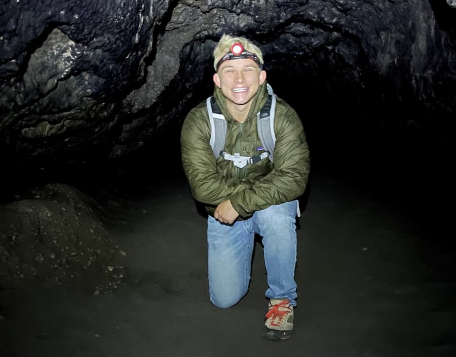 Brandon Radford in a cave