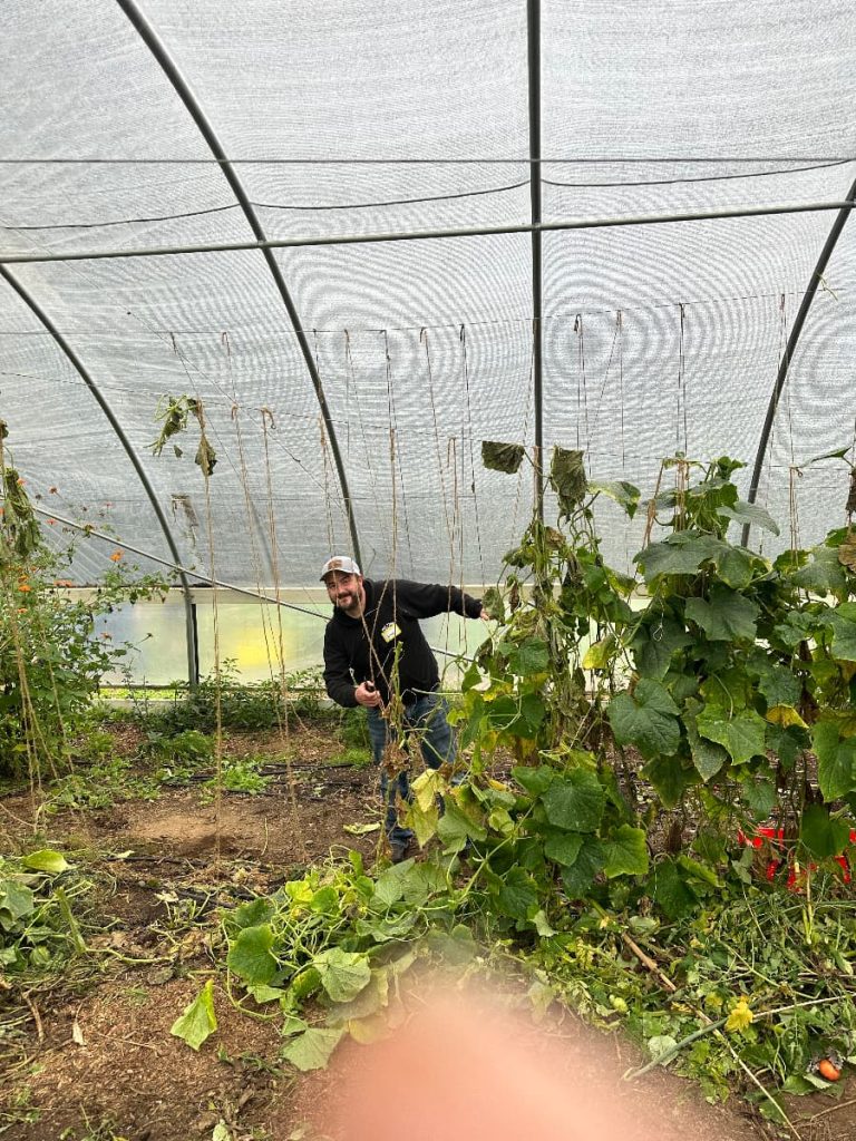 Columbia Team Member at the Kindness Farm